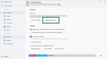 macOS Finder's iPhone screen with the Restore iPhone button in focus.