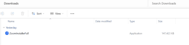 Downloads folder showing the ExpressVPN Windows installer listed as an application.