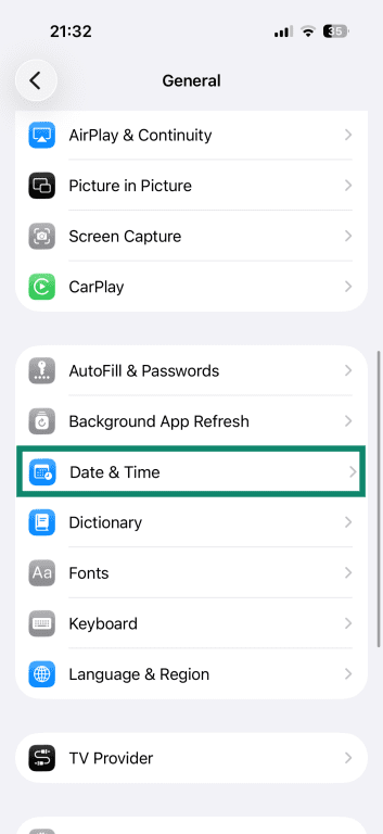 iPhone General settings, with the Date & Time option highlighted.