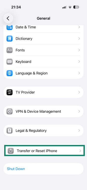 iPhone General settings, with the Transfer or Reset iPhone option highlighted.
