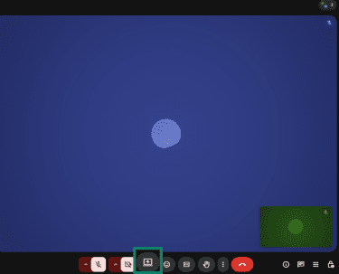 Share screen icon in the bottom bar of Google Meet desktop