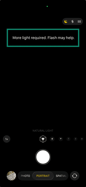 iPhone camera giving suggestions when snapping a picture in Portrait mode.